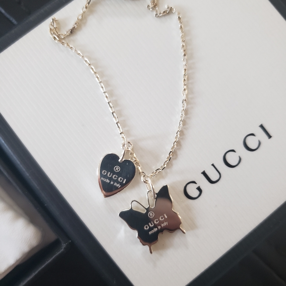 Gucci- butterfly heart charm bracelet
